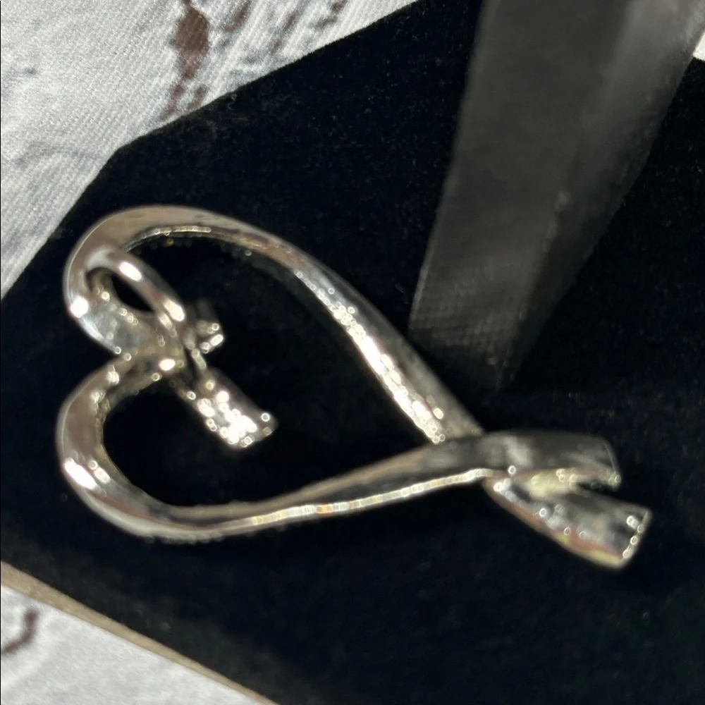 Elegant Silver Heart-Shaped Pendant CZ diamonds 2”